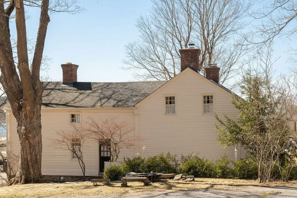 side facade with view of yard