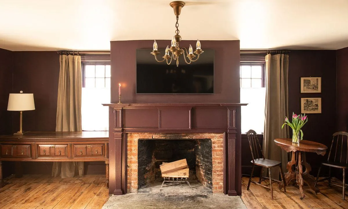 living room with mantel,