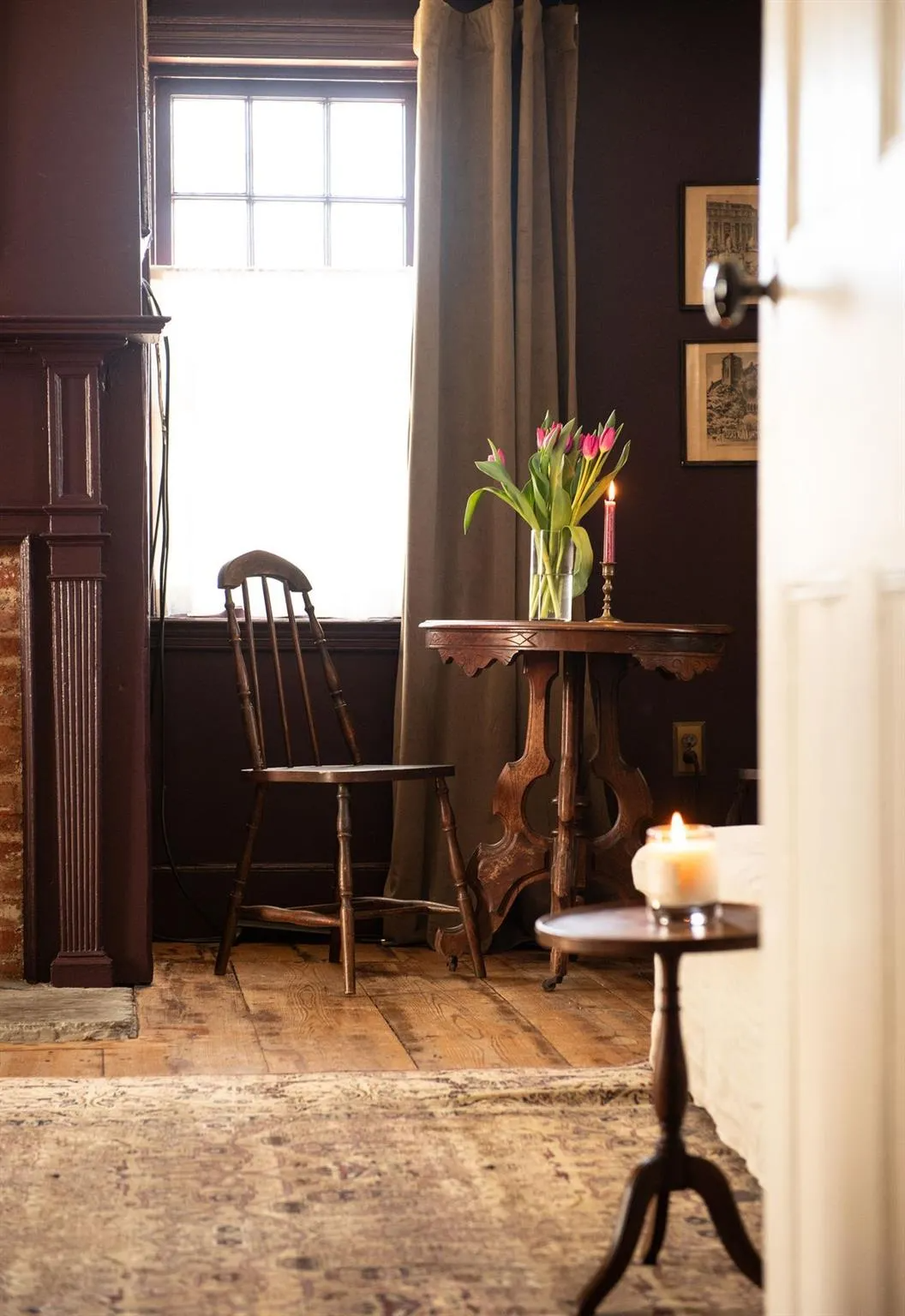 living room with wide plank floorboards