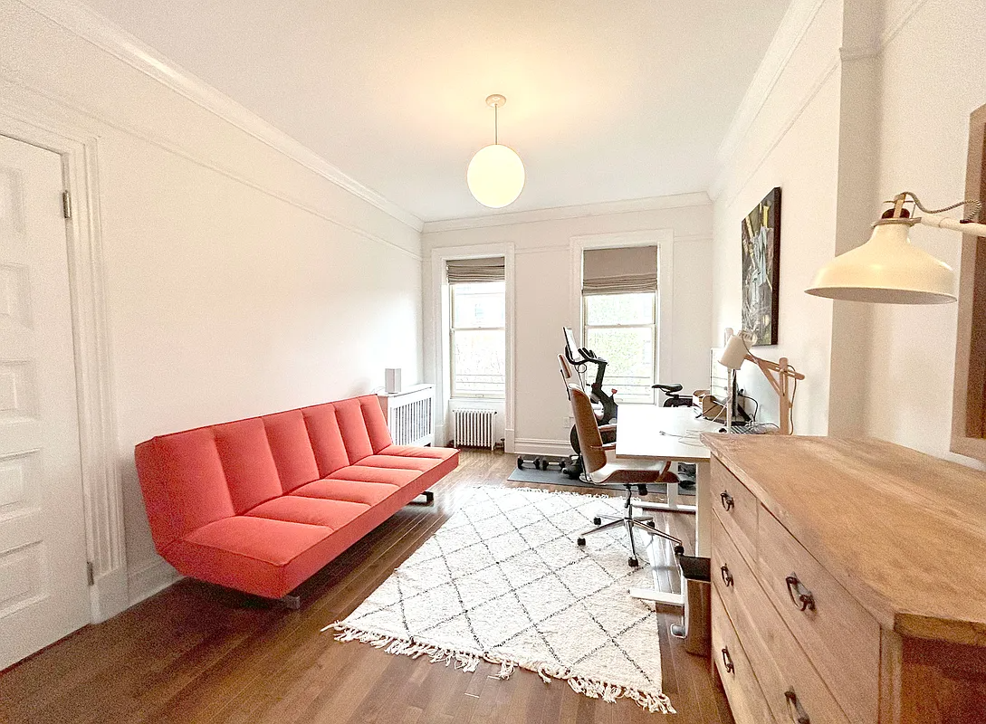 bedroom set up as an office