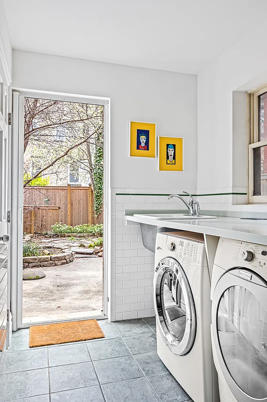 garden level mudroom with laundry, sliding doors to rear yard