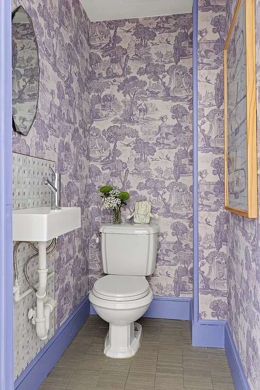 powder room with purple toile wallpaper