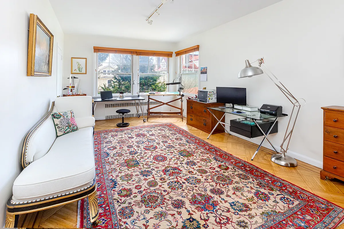 bedroom with two exposures set up as an office