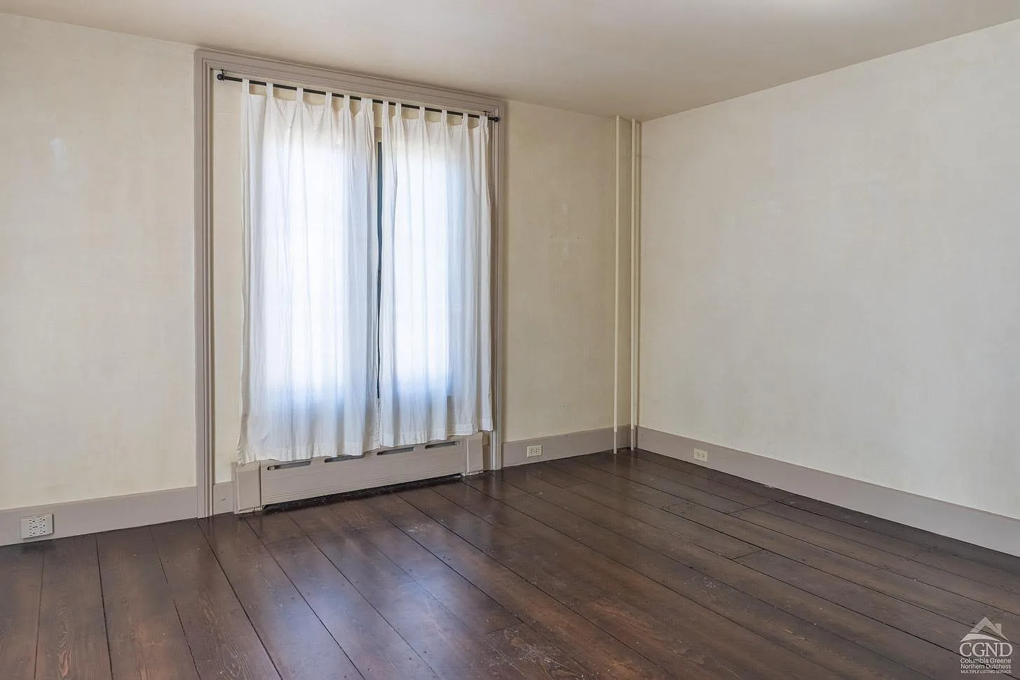 bedroom with wood floor,