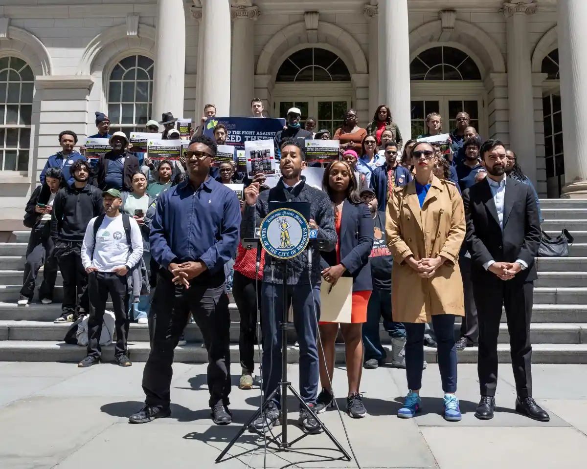 Dozens of local elected officials and victims of deed theft urged the City Council to fund legal services for victims of deed theft at a May 20 rally.