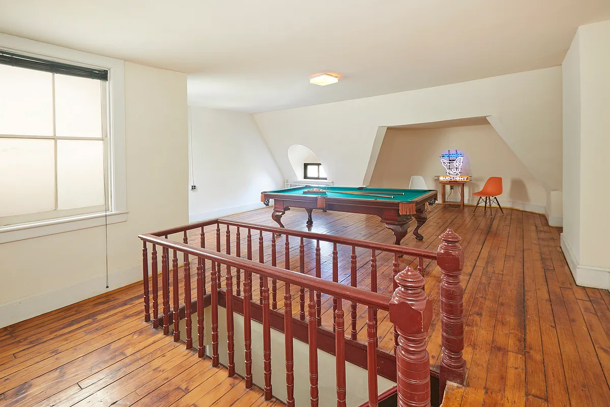 attic with pool table