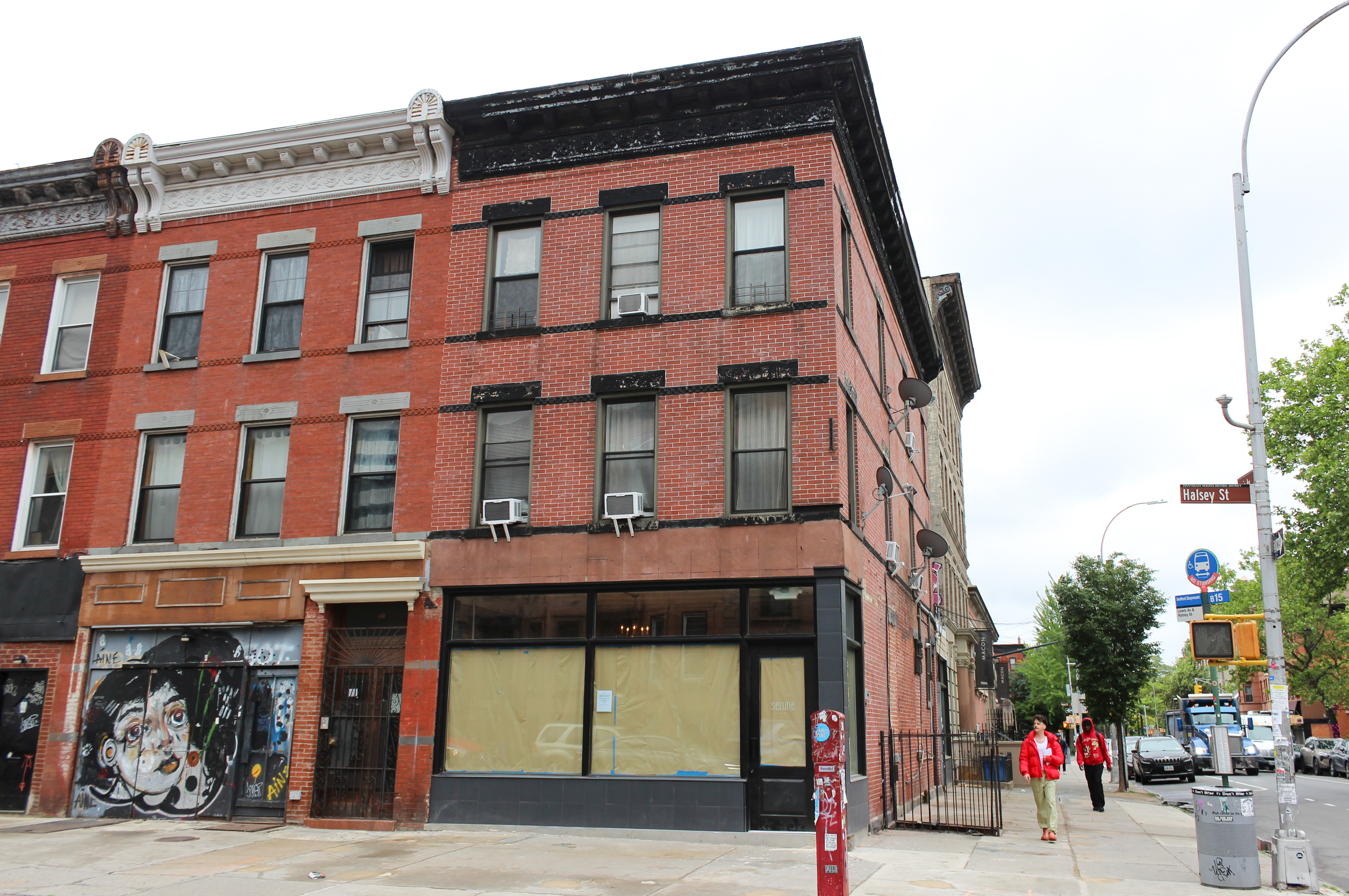 storefront with windows papered over