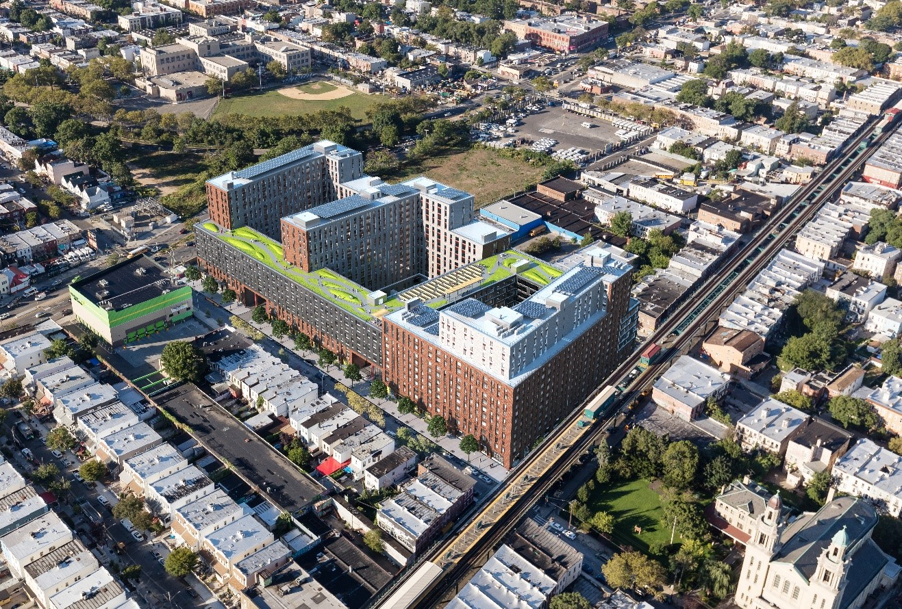 rendering of an aerial view of the building with green rooftops and interior courtyards