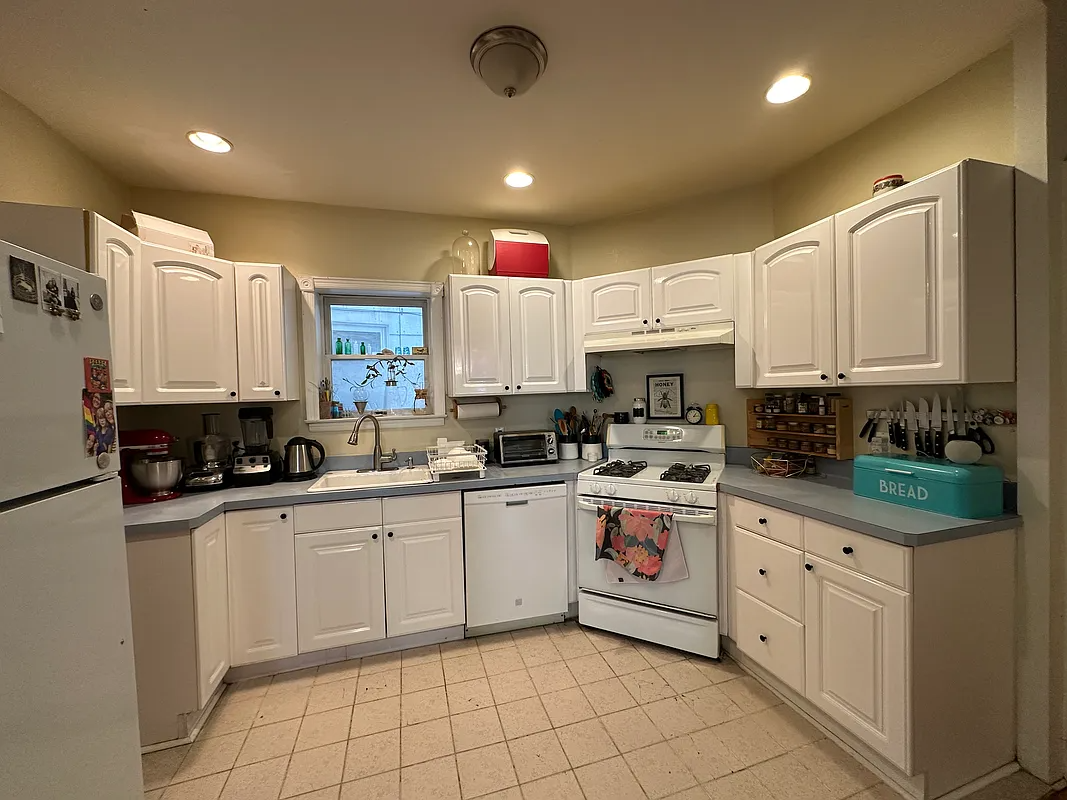 kitchen with tile floor, recessed lighting