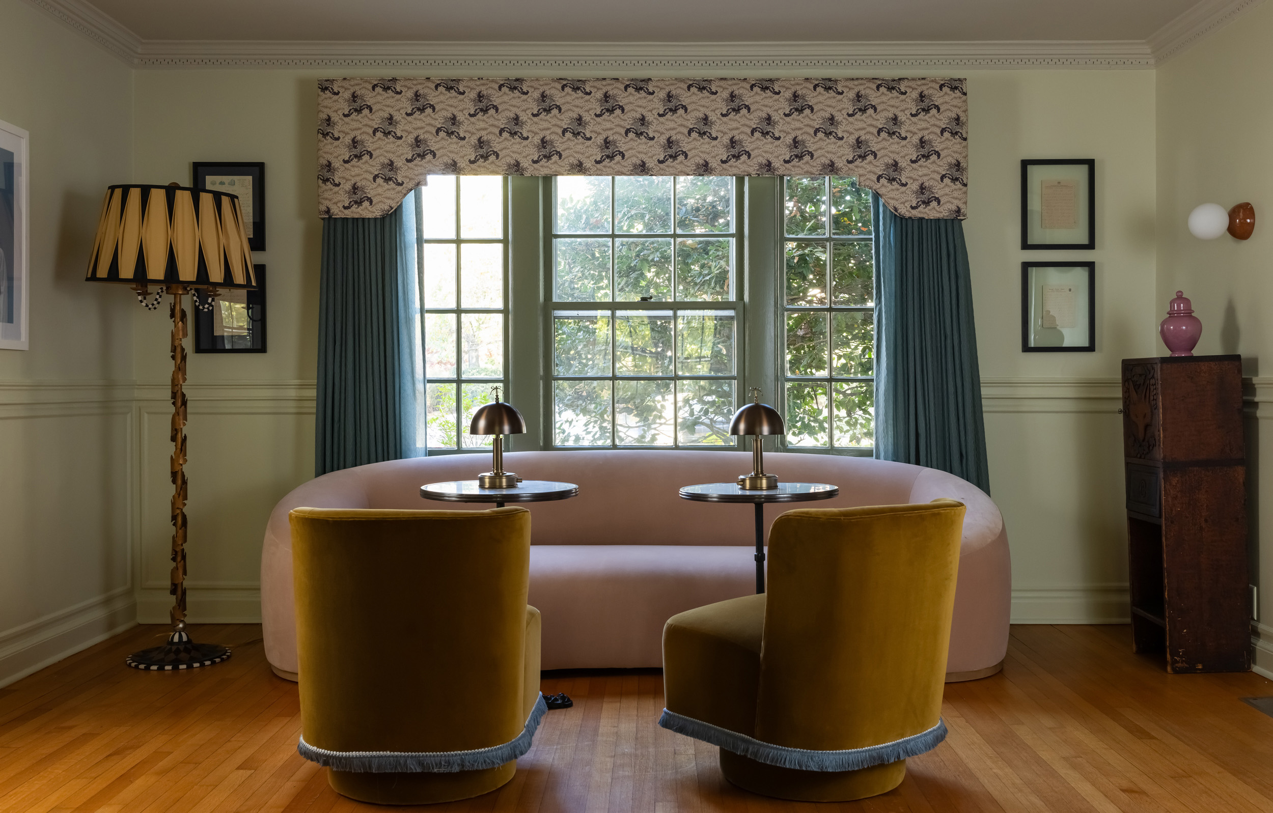 living room with curved sofa