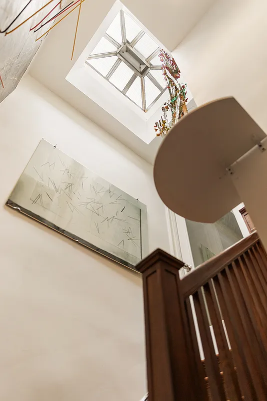look up the stair to the skylight