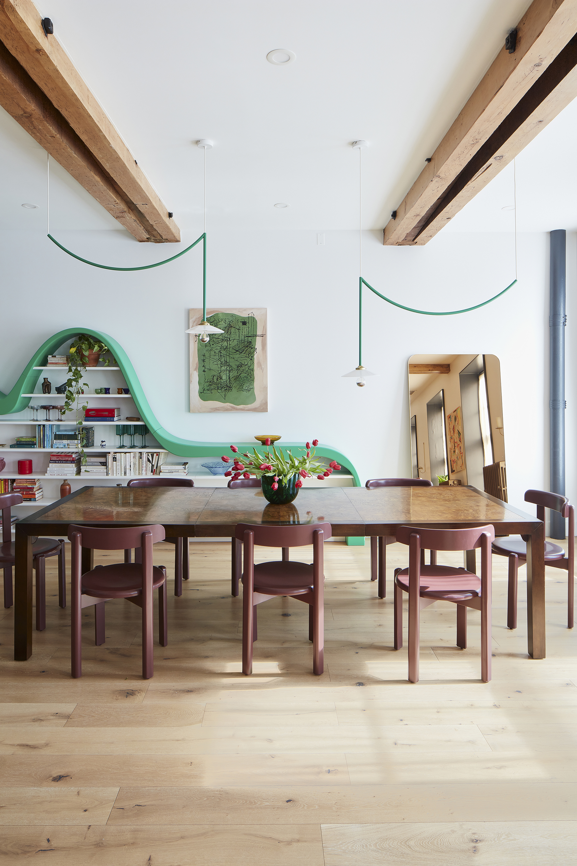 DINING AREA WITH GREEN CURVED SHELF