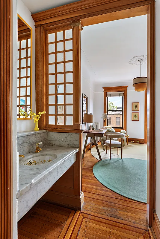 marble sink in a passthrough between bedrooms