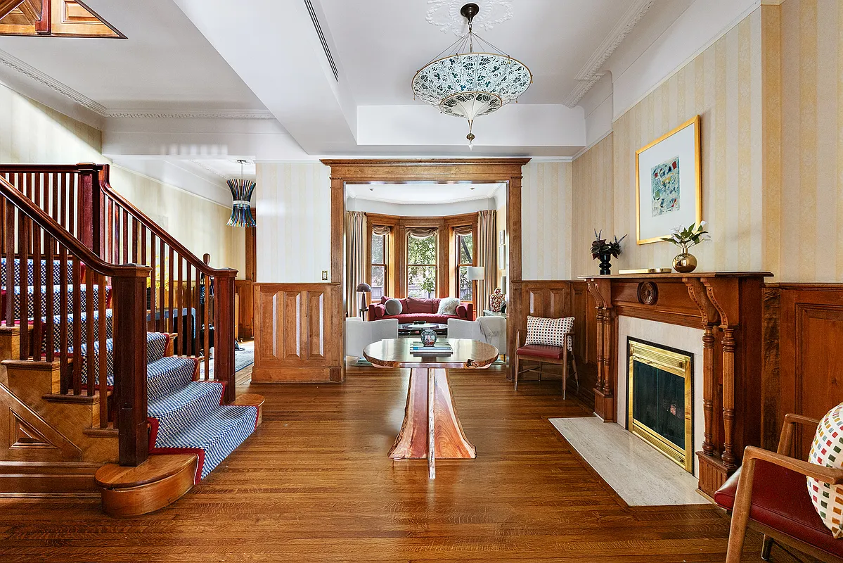 middle parlor with wood floor, wainscoting