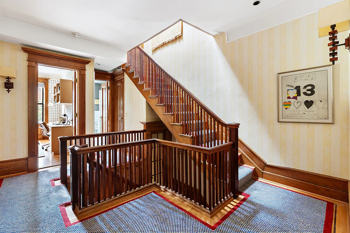 stair landing with checkered runner