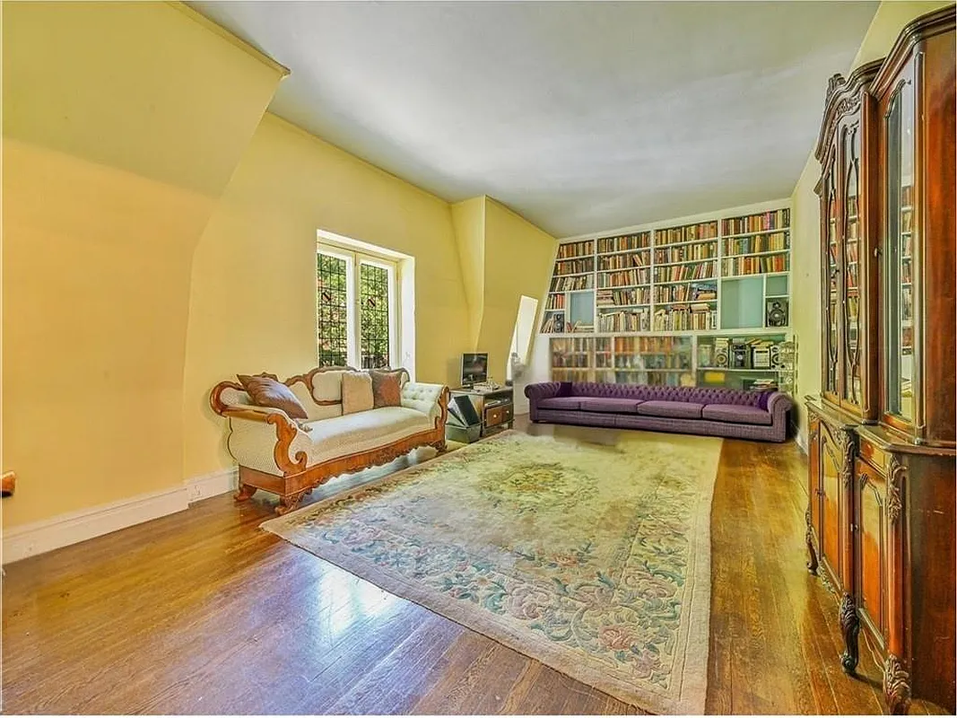 living room with built-in bookcases