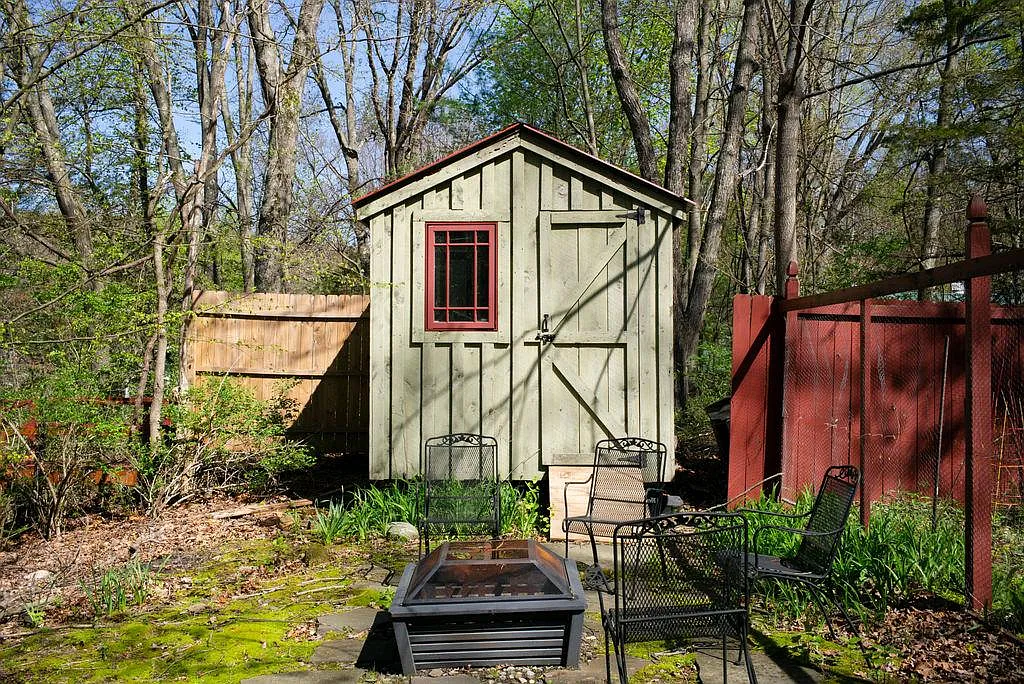 fire pit area near an outbuilding