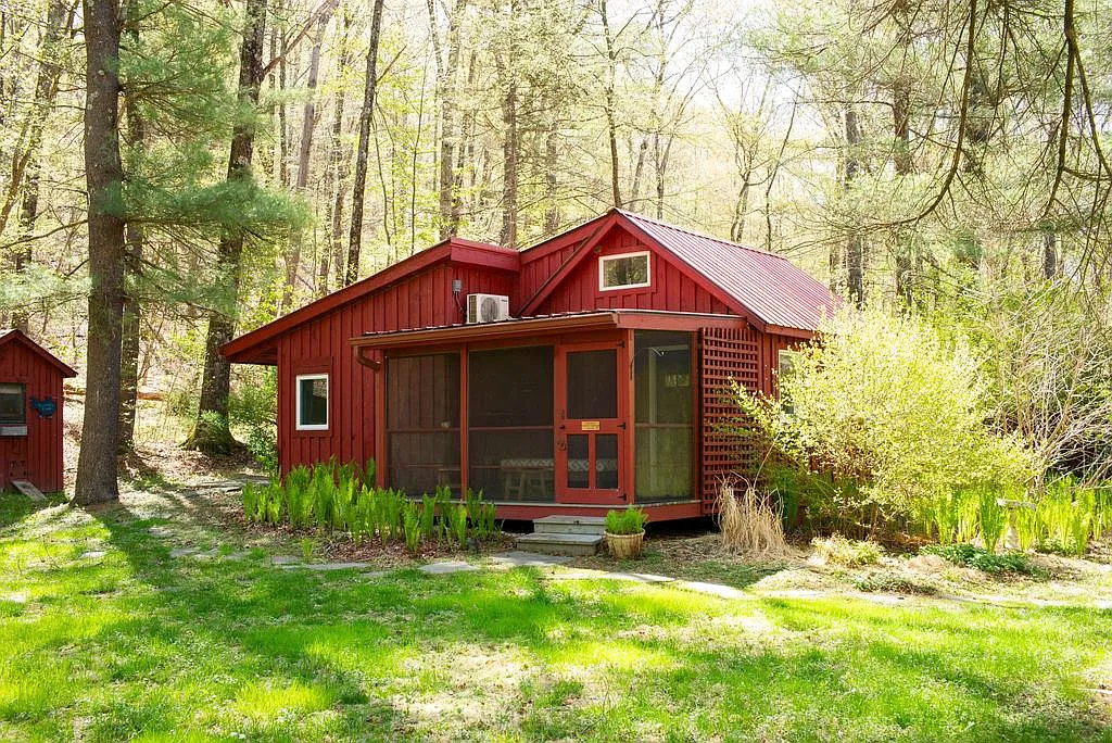 cottage - red sided cottage with screened-in porch