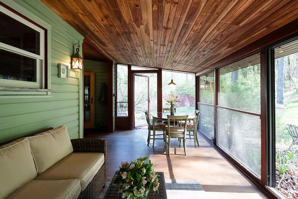 screened in porch with room for dining