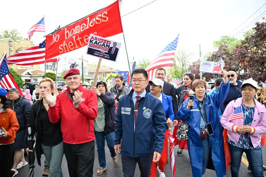 Curtis Sliwa and State Sen. Stephen Chan lead a protest march in opposition to a city shelter plan they say lacks transparency — one of countless demonstrations held at the Coyle Street site since early this year, many of them also led by the duo.