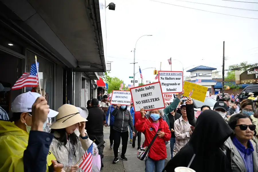 Hundreds march along Coney Island Avenue on May 4, protesting the city’s plan to convert a former affordable housing site into a family homeless shelter in Sheepshead Bay.