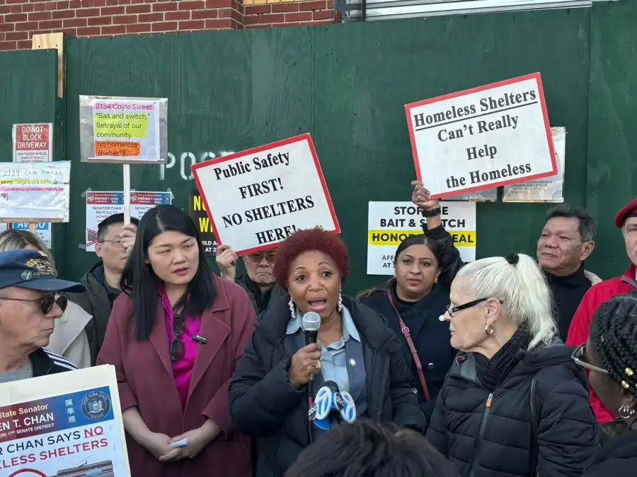 Democratic Council Member Mercedes Narcisse speaks at a recent protest outside the planned Coyle Street shelter, joining a growing number of local officials calling on the city to cancel the contract and honor its original plan for affordable housing.