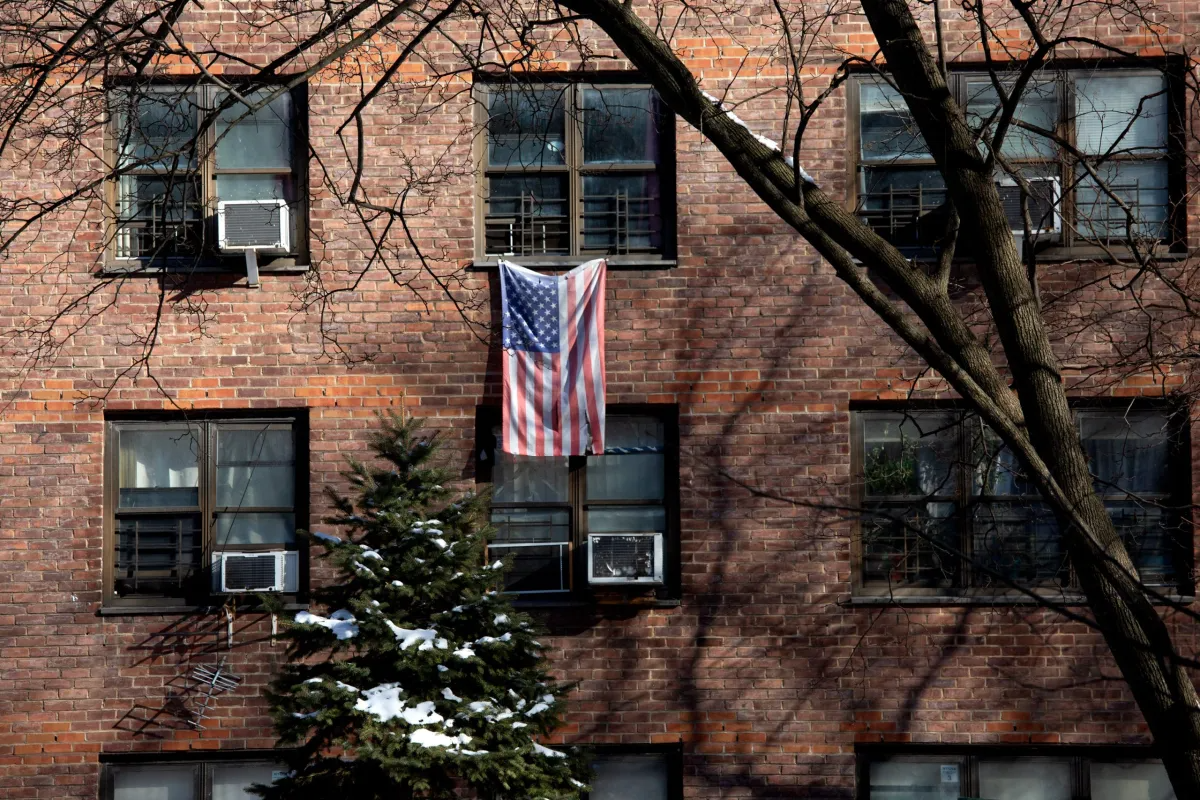 A George Washington Houses resident in East Harlem displays their patriotism