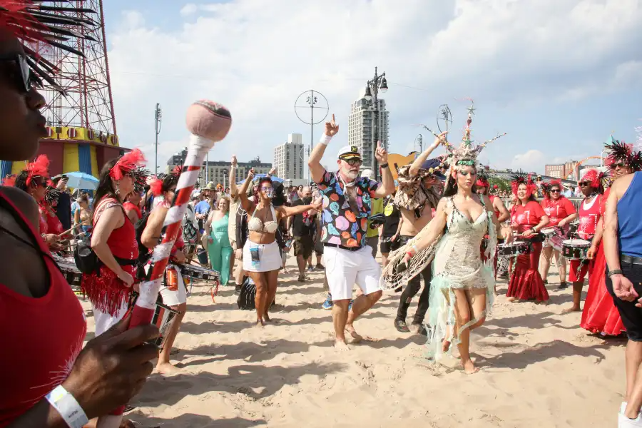 King Neptune and Queen Queenie join Coney Island USA artistic director Adam Rinn for the traditional summer season blessing at Coney Island’s beach.