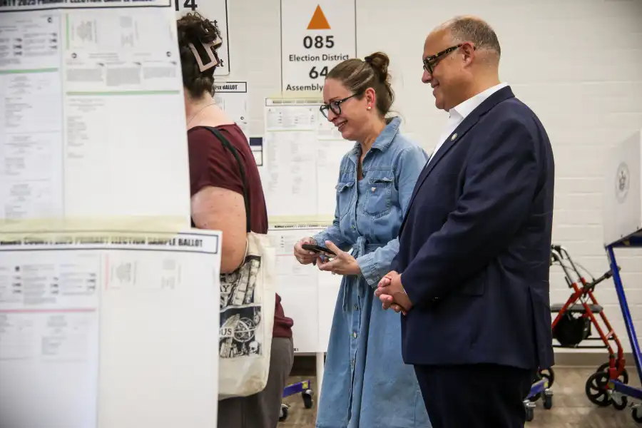 Council Member Justin Brannan, a candidate for City Comptroller, casts his vote alongside his wife, Leigh Holliday Brannan, at Shore Hill Housing in Bay Ridge.