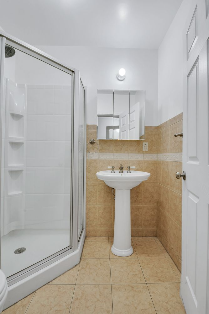 bathroom with corner shower