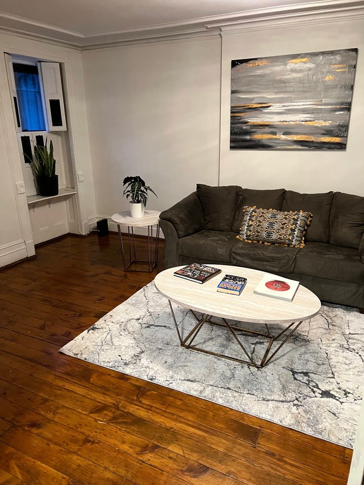 living room furnished with a sofa and cofffee table