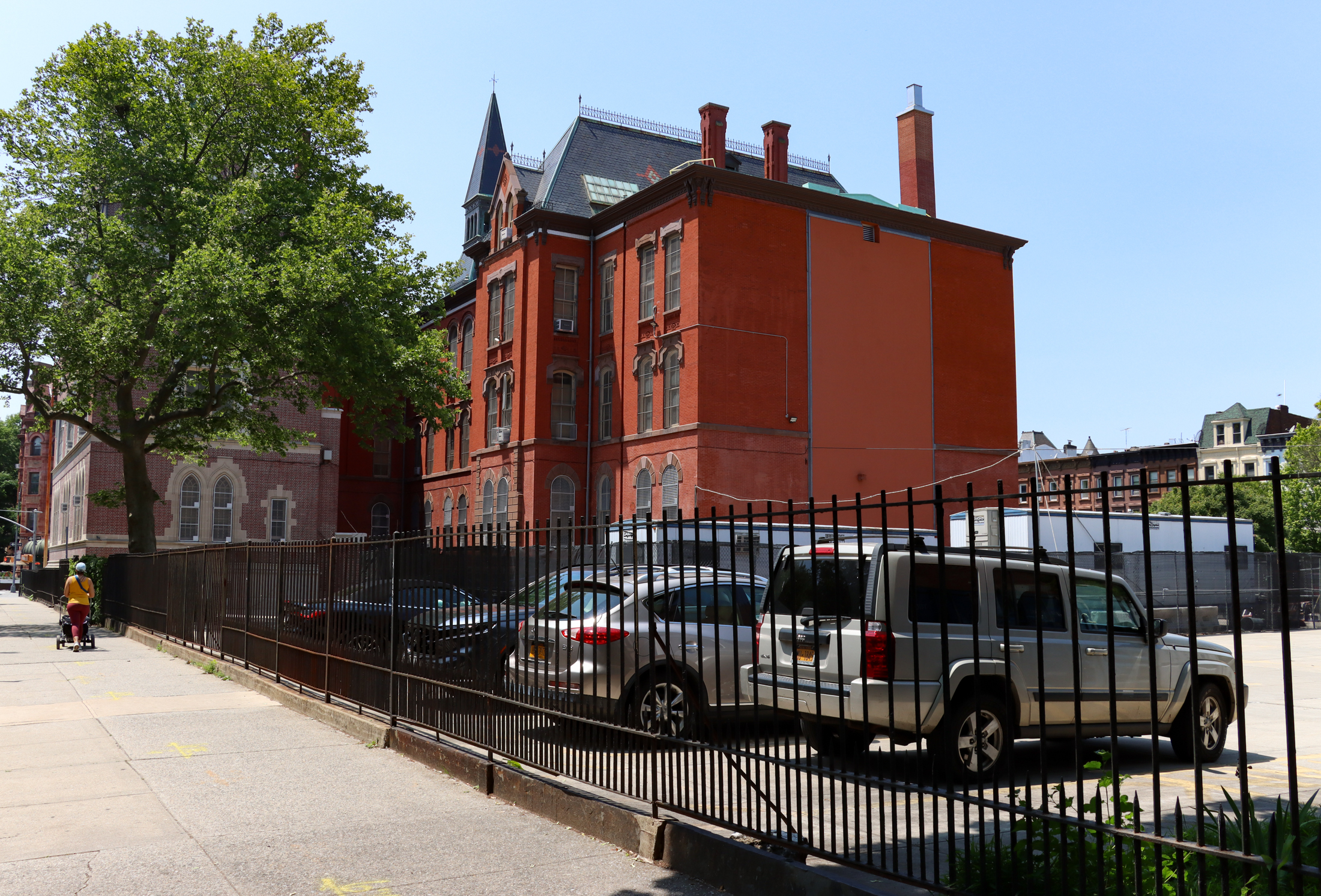 view on macon street of the parking lot and the school