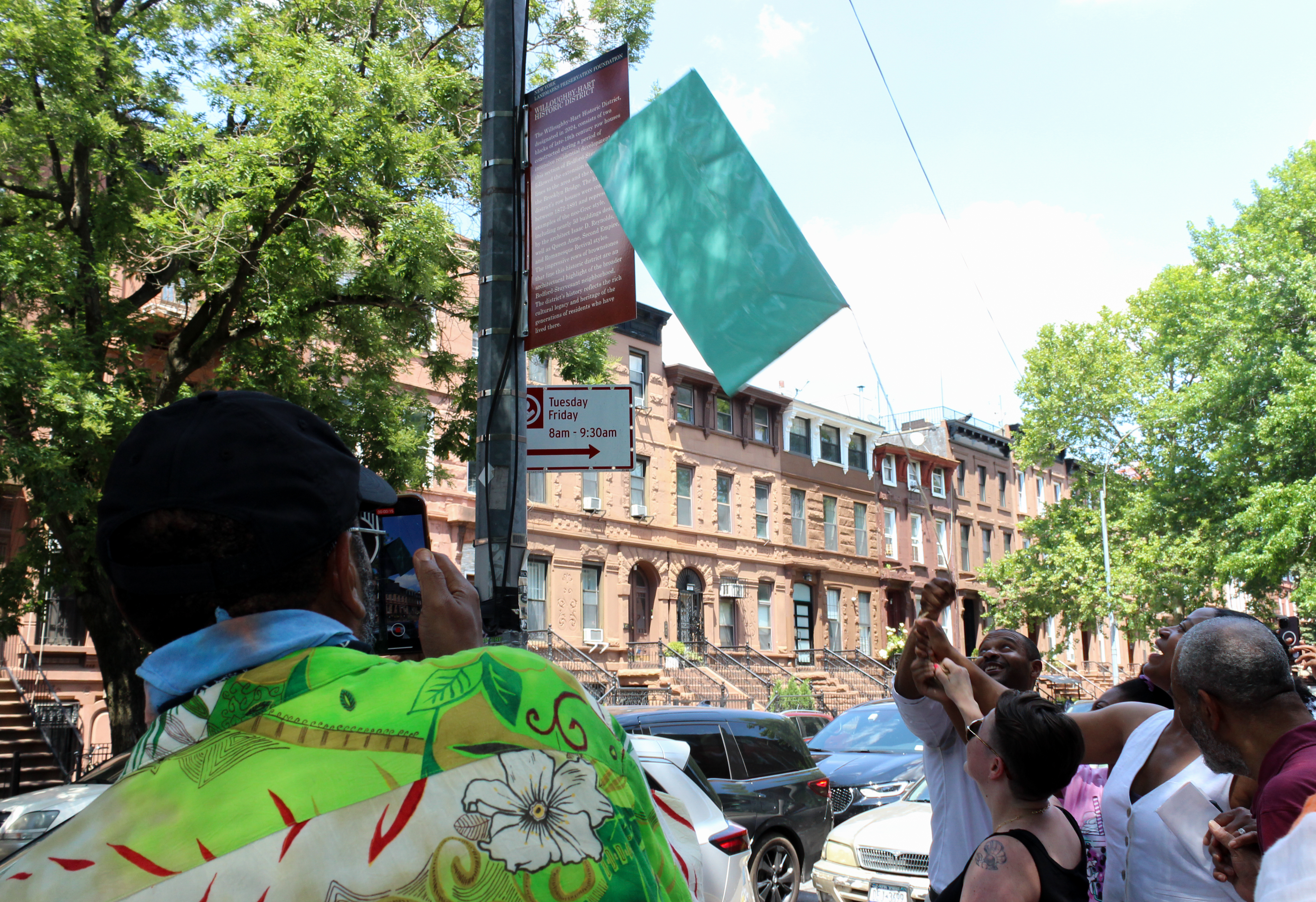 the sign being unveiled