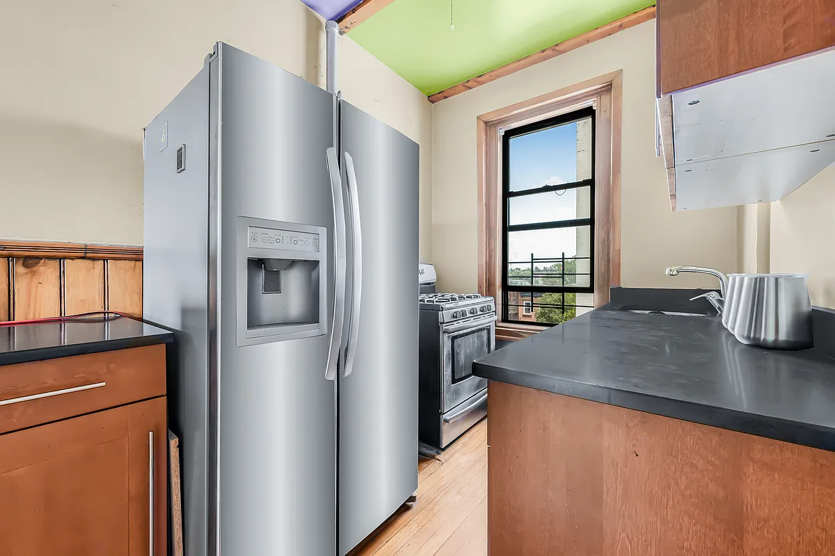 kitchen with wood cabinets, stainless steel appliances