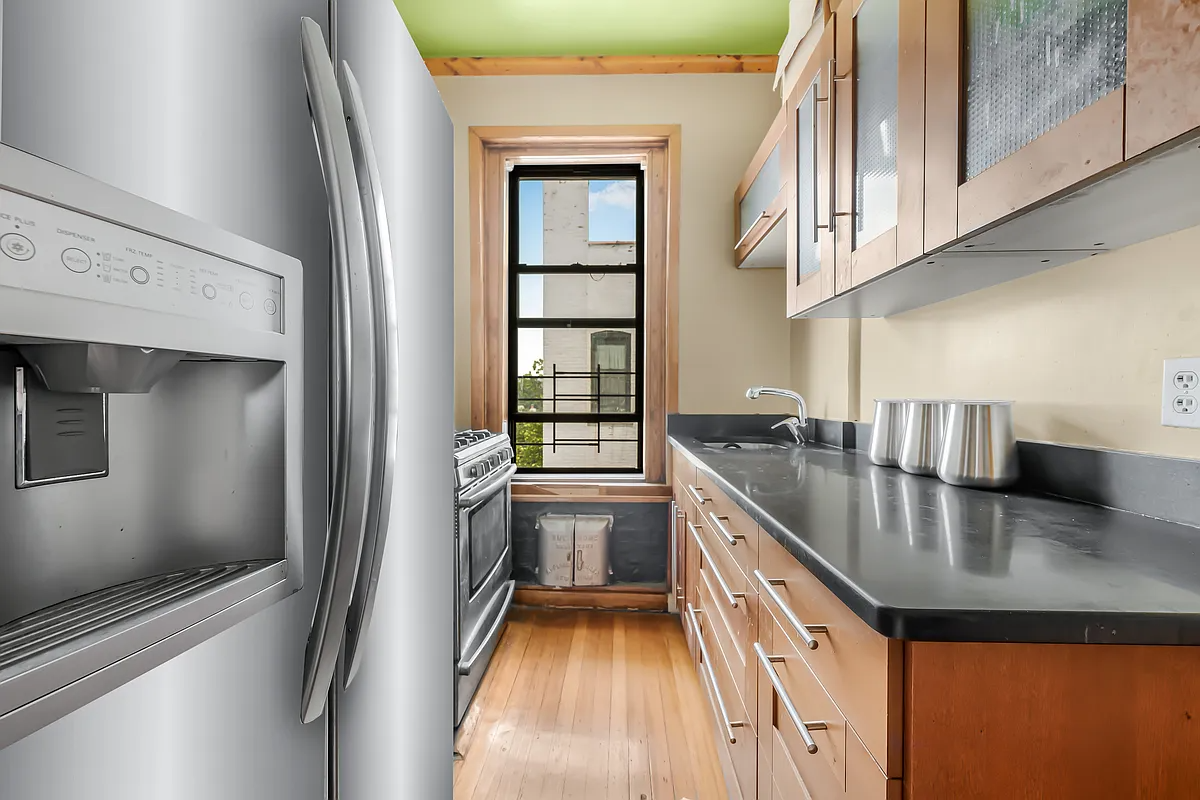 kitchen with wood cabinets, stainless steel appliances