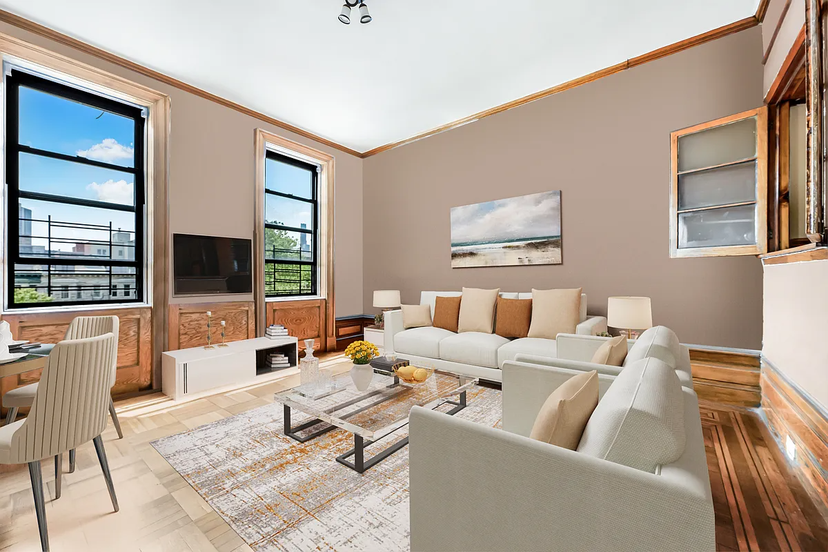 virtually staged dining room set up as a living room with dining