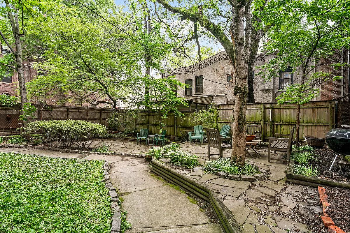 rear courtyard with seating and barbeque