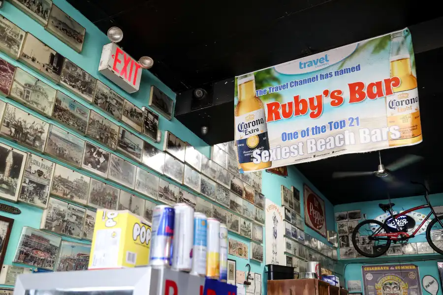 The interior of Ruby’s Bar & Grill is lined with historic photos, showcasing decades of Coney Island memories and the bar’s deep-rooted legacy on the boardwalk.