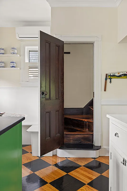 view of back staircase in kitchen