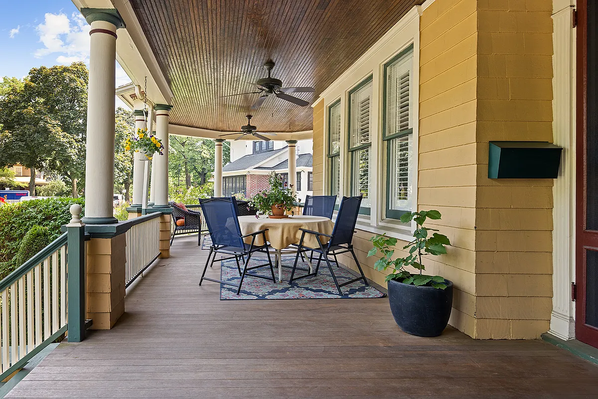 wraparound porch with room for dining