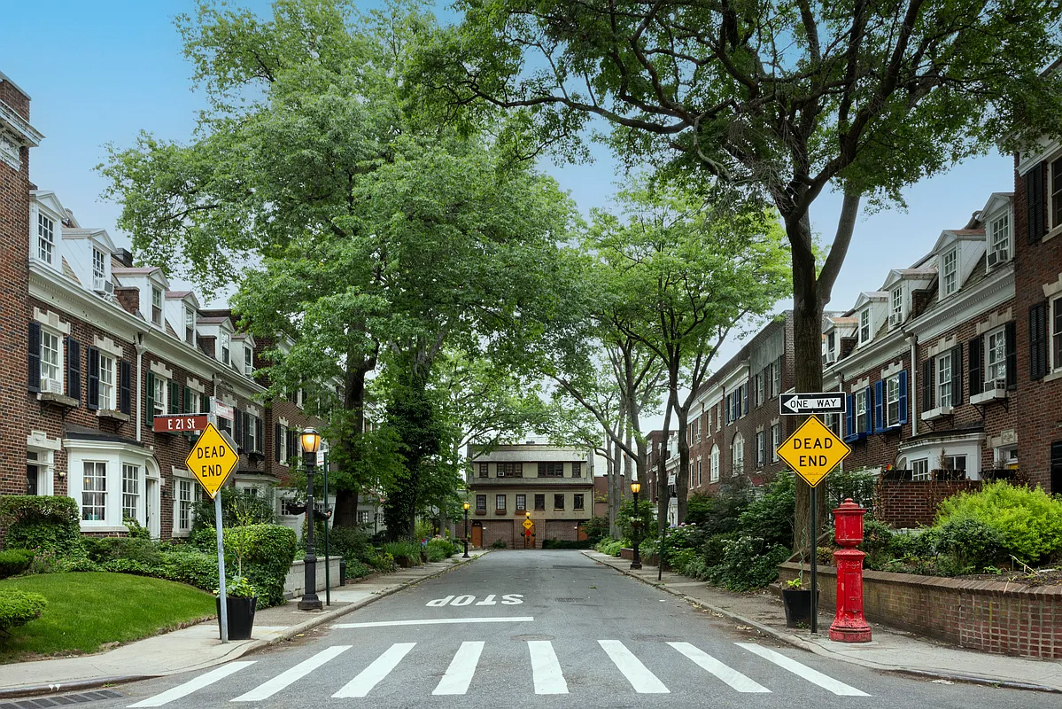 streetview of rows of ne-federal brick, row house