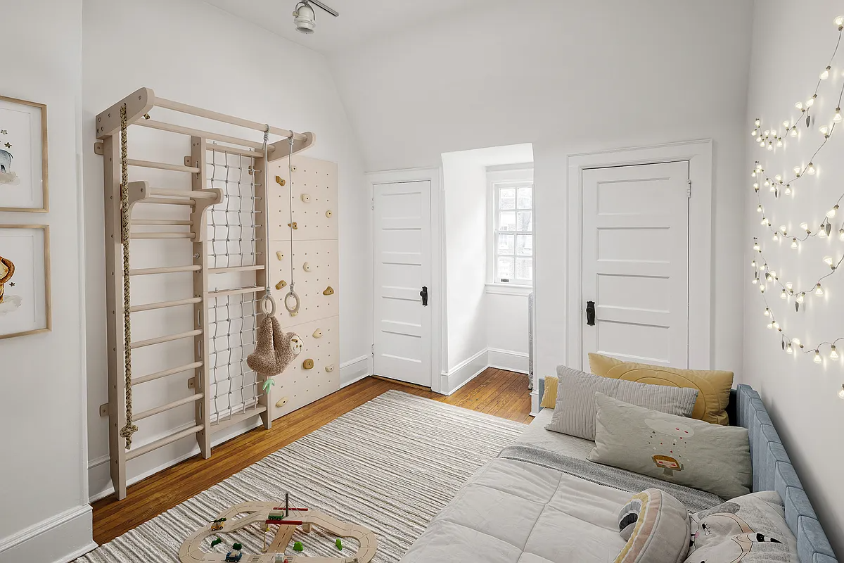 virtually staged bedroom set up as a a play room