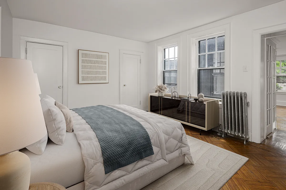 virtually staged bedroom with french door to sleeping porch
