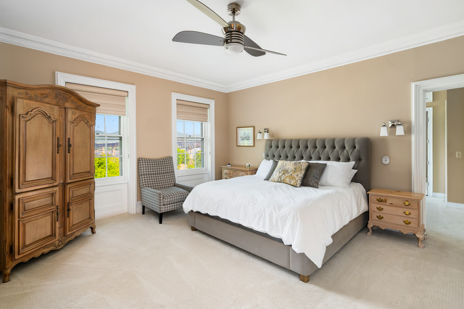 bedroom with wall-to-wall carpet, ceiling fan