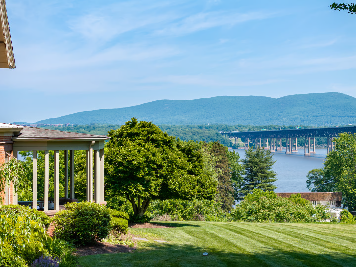 view of the hudson river and the newburg-beacon bridge from the lawn next to the house