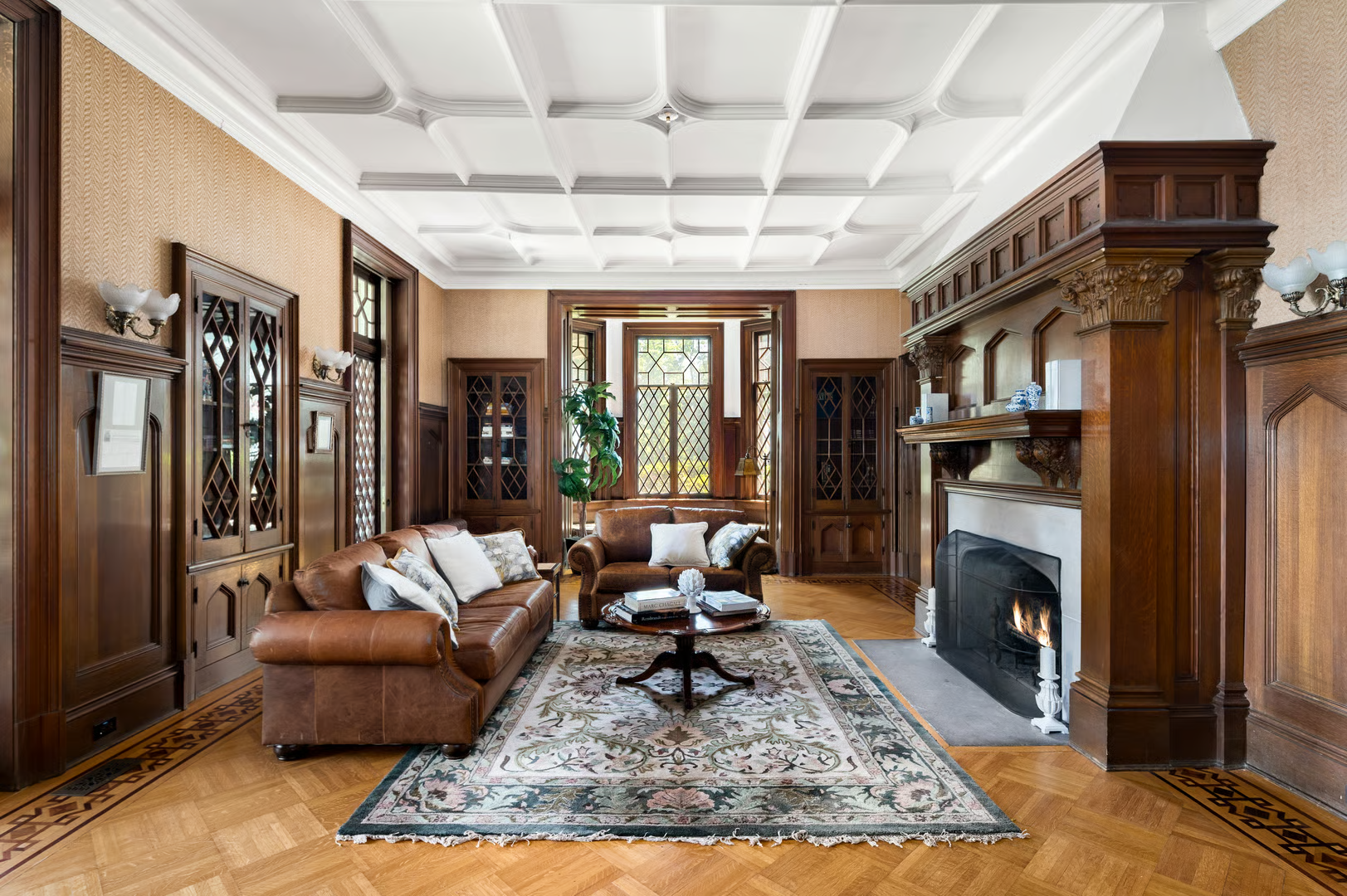 library with built-ins, wainscoting, mantel