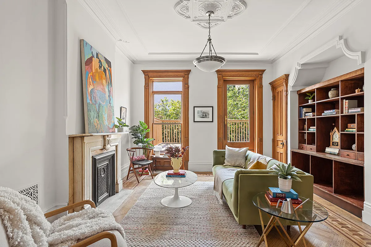 living room with a marble mantle