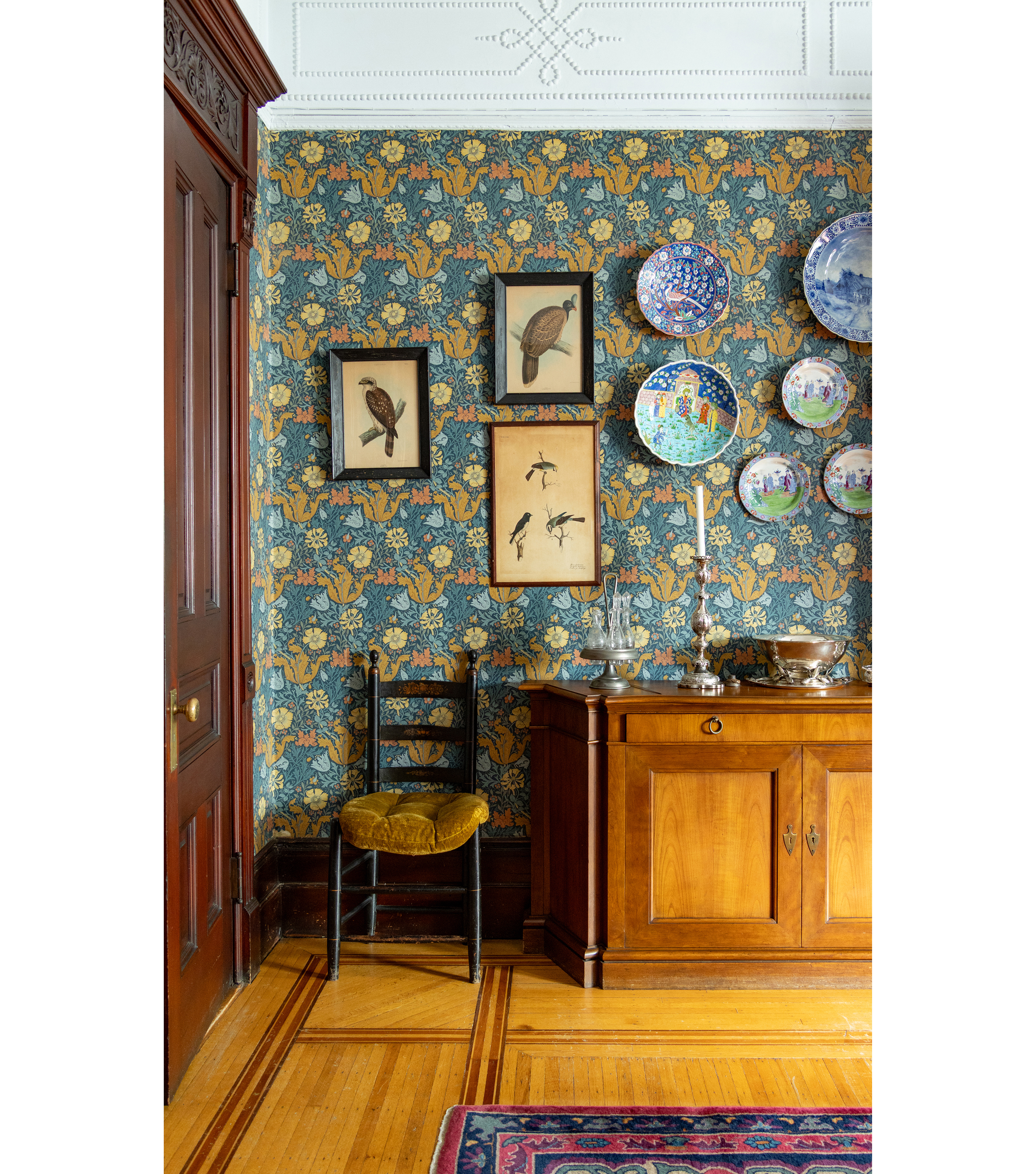 dining room with floral wallpaper