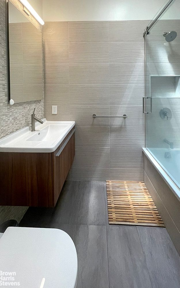 bathroom with oversized tile floor