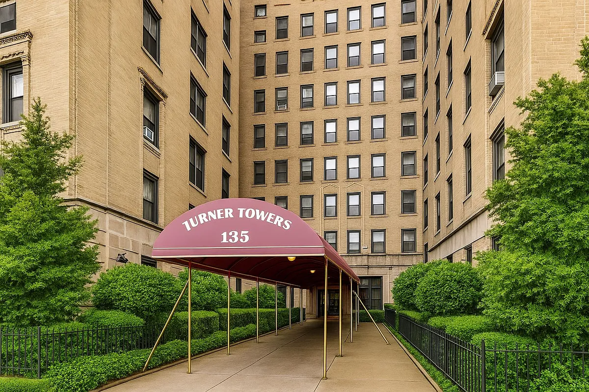 pale brick exterior with awning with turner towers name